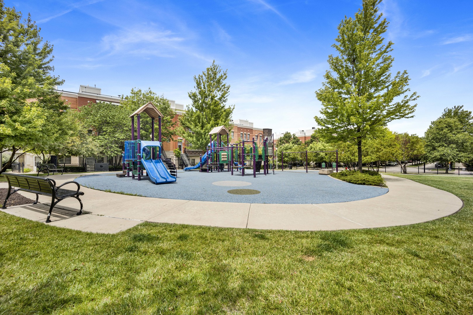 1111 West 15th Street, Unit 224 Chicago, IL 60608 - Photo 56 of 71 a view of a park with bench and trees