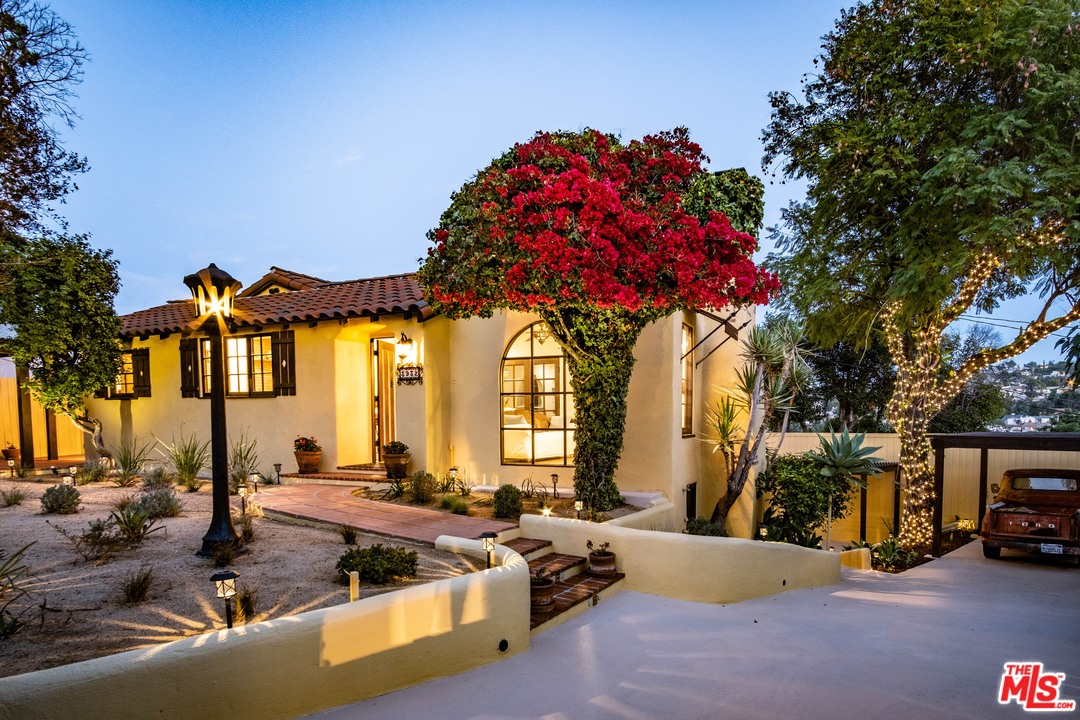 3932 Roderick Road Los Angeles, CA 90065 - Photo 1 of 43 a view of a house with cars park fire pit and outdoor seating