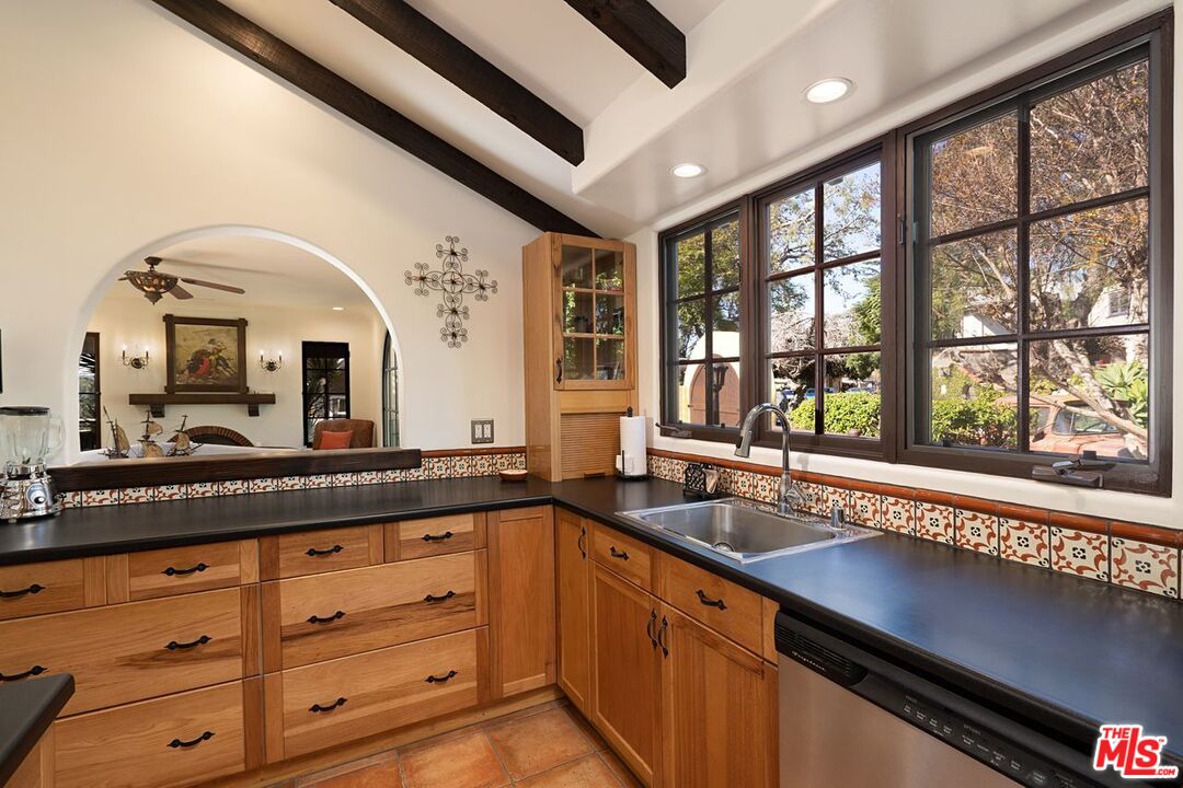 3932 Roderick Road Los Angeles, CA 90065 - Photo 18 of 43 a kitchen with large windows and sink