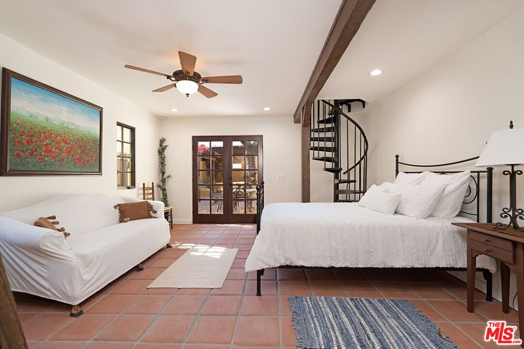 3932 Roderick Road Los Angeles, CA 90065 - Photo 25 of 43 a spacious bedroom with a bed couch and a window