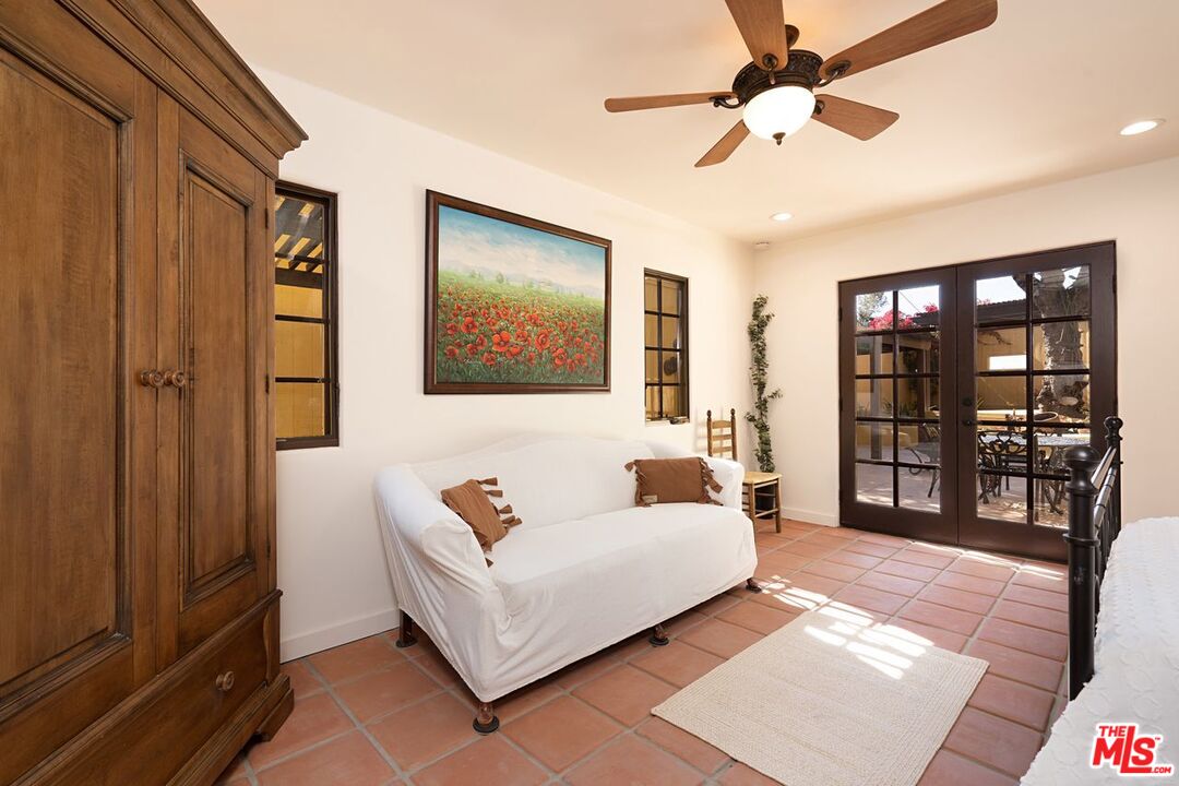 3932 Roderick Road Los Angeles, CA 90065 - Photo 26 of 43 a living room with furniture and a flat screen tv