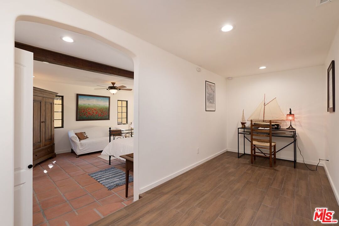 3932 Roderick Road Los Angeles, CA 90065 - Photo 27 of 43 a living room with furniture and a wooden floor
