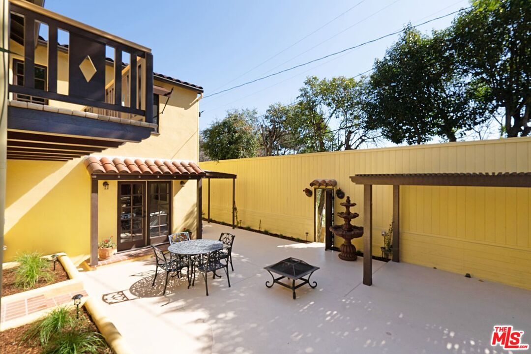 3932 Roderick Road Los Angeles, CA 90065 - Photo 30 of 43 a view of a patio with a table and chairs