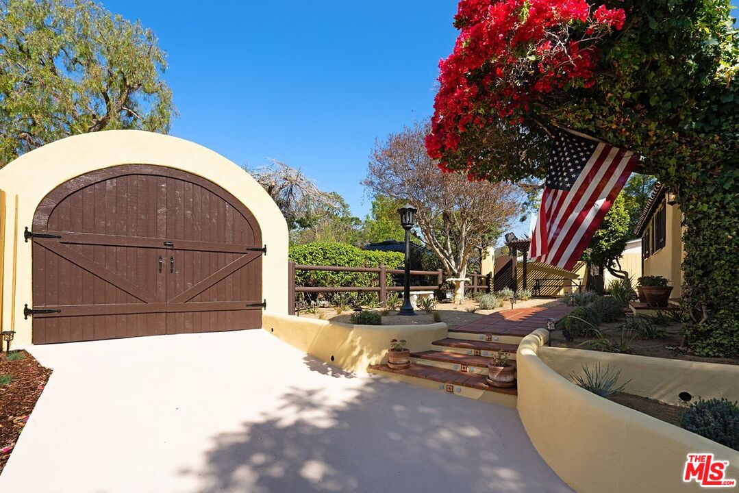 3932 Roderick Road Los Angeles, CA 90065 - Photo 4 of 43 a view of a swimming pool with a patio