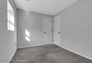 1429 Lakewood Road Manasquan, NJ 08736 - Photo 11 of 26 a view of empty room with window