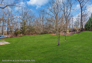 1429 Lakewood Road Manasquan, NJ 08736 - Photo 23 of 26 a view of field with tall trees