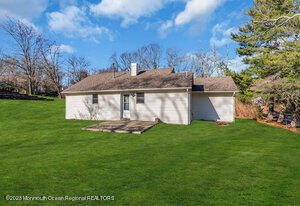 1429 Lakewood Road Manasquan, NJ 08736 - Photo 25 of 26 a view of a house with a yard