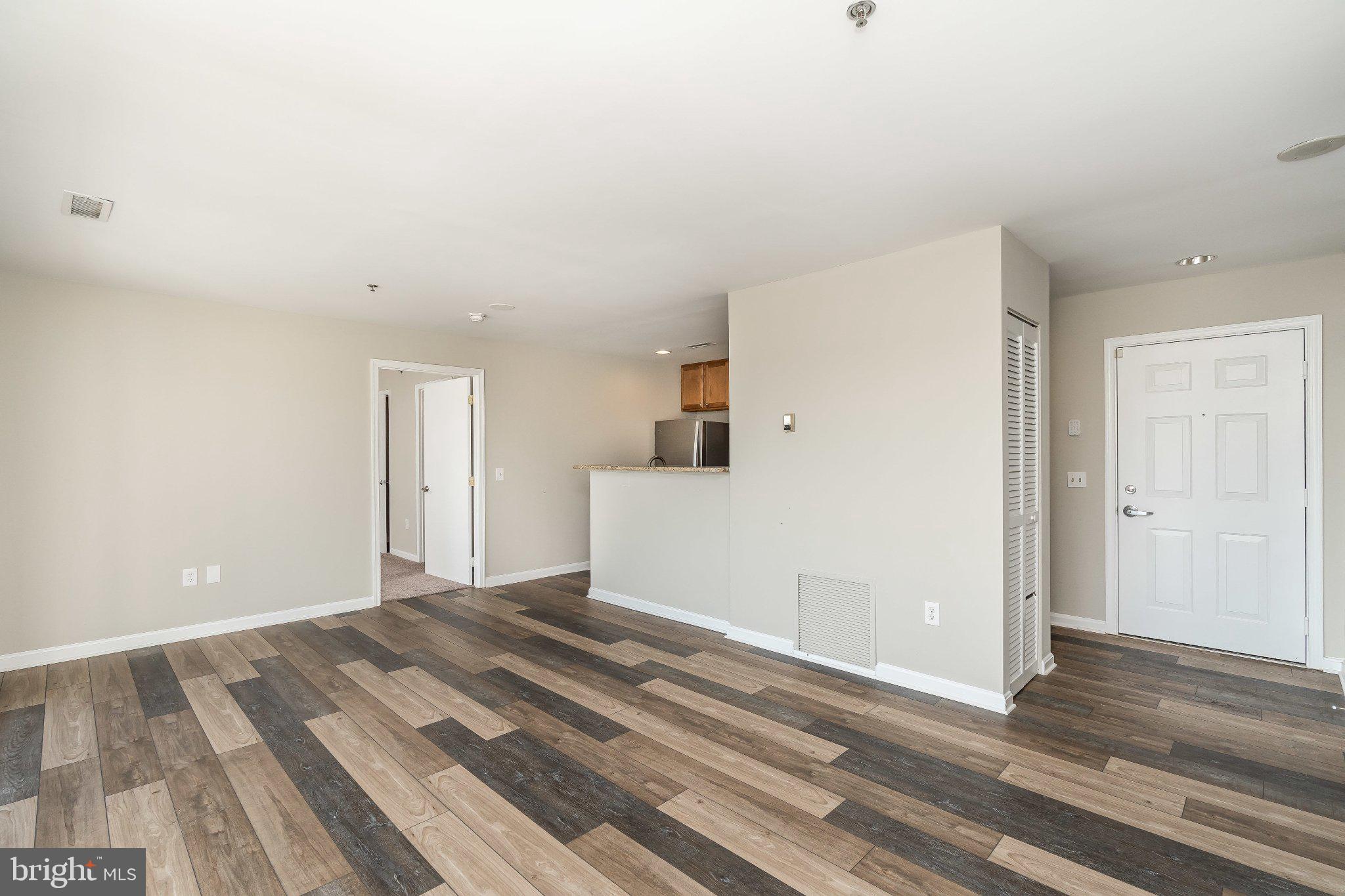 2702 Lighthouse Point East, Unit 532 Baltimore, MD 21224 - Photo 11 of 41 Spacious, modern living area awaits you.