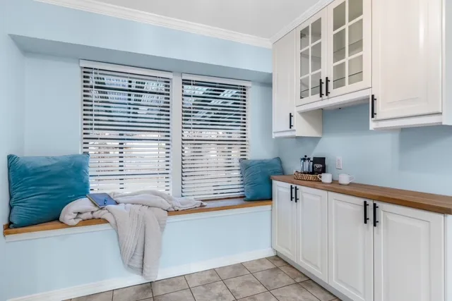 a view of a porch with wooden floor