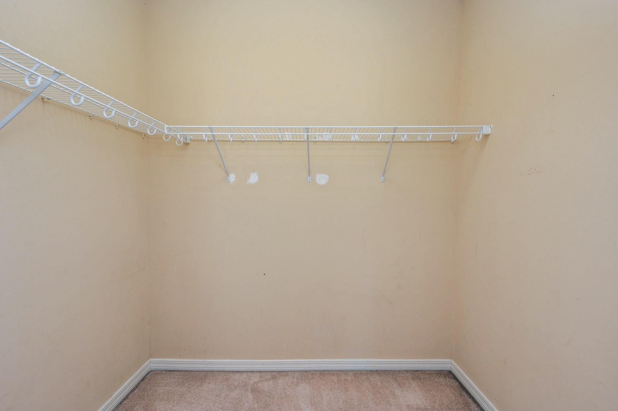 202 Ladue Avenue Crestview, FL 32539 - Photo 21 of 33 a view of a room with racks on the wall