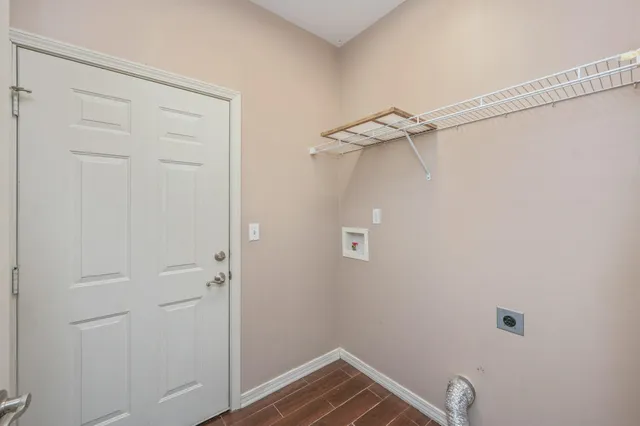 a view of a room with rack on the wall