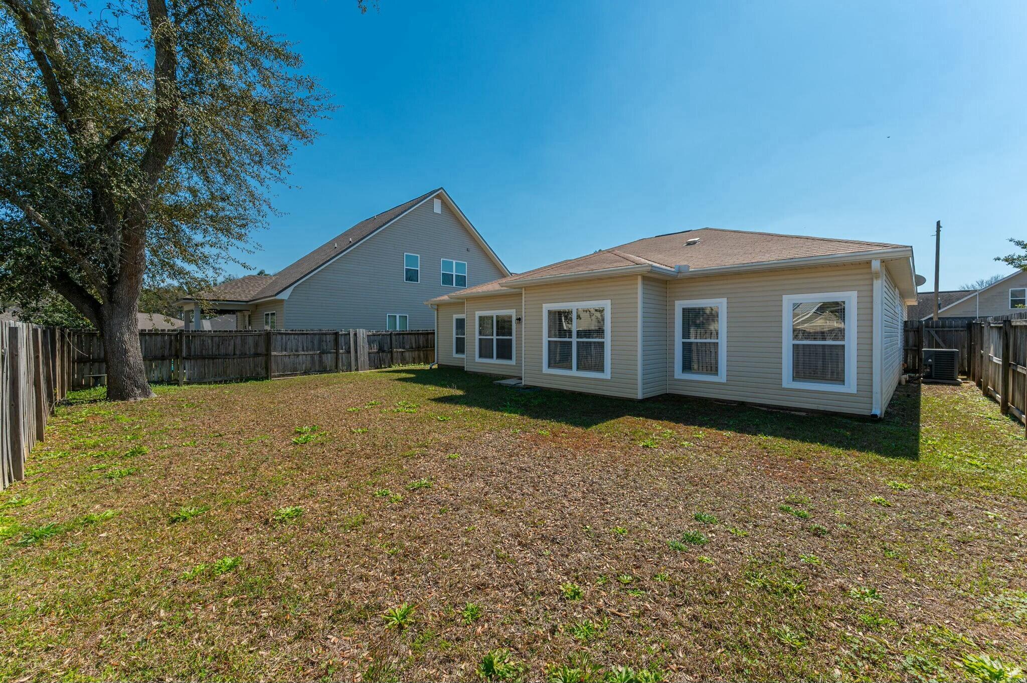 202 Ladue Avenue Crestview, FL 32539 - Photo 28 of 33 a front view of a house with a yard