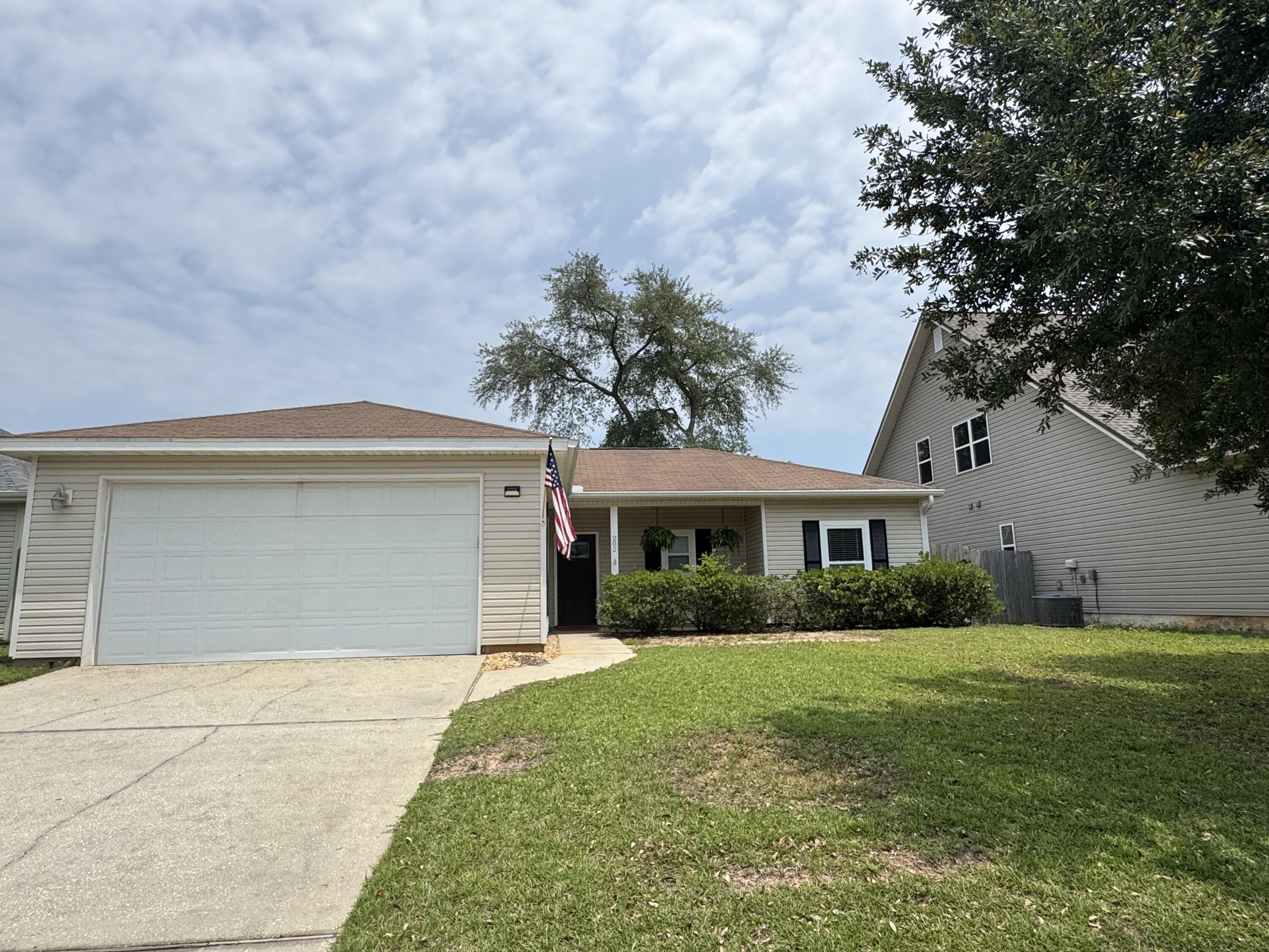 202 Ladue Avenue Crestview, FL 32539 - Photo 3 of 33 a view of house that has a yard