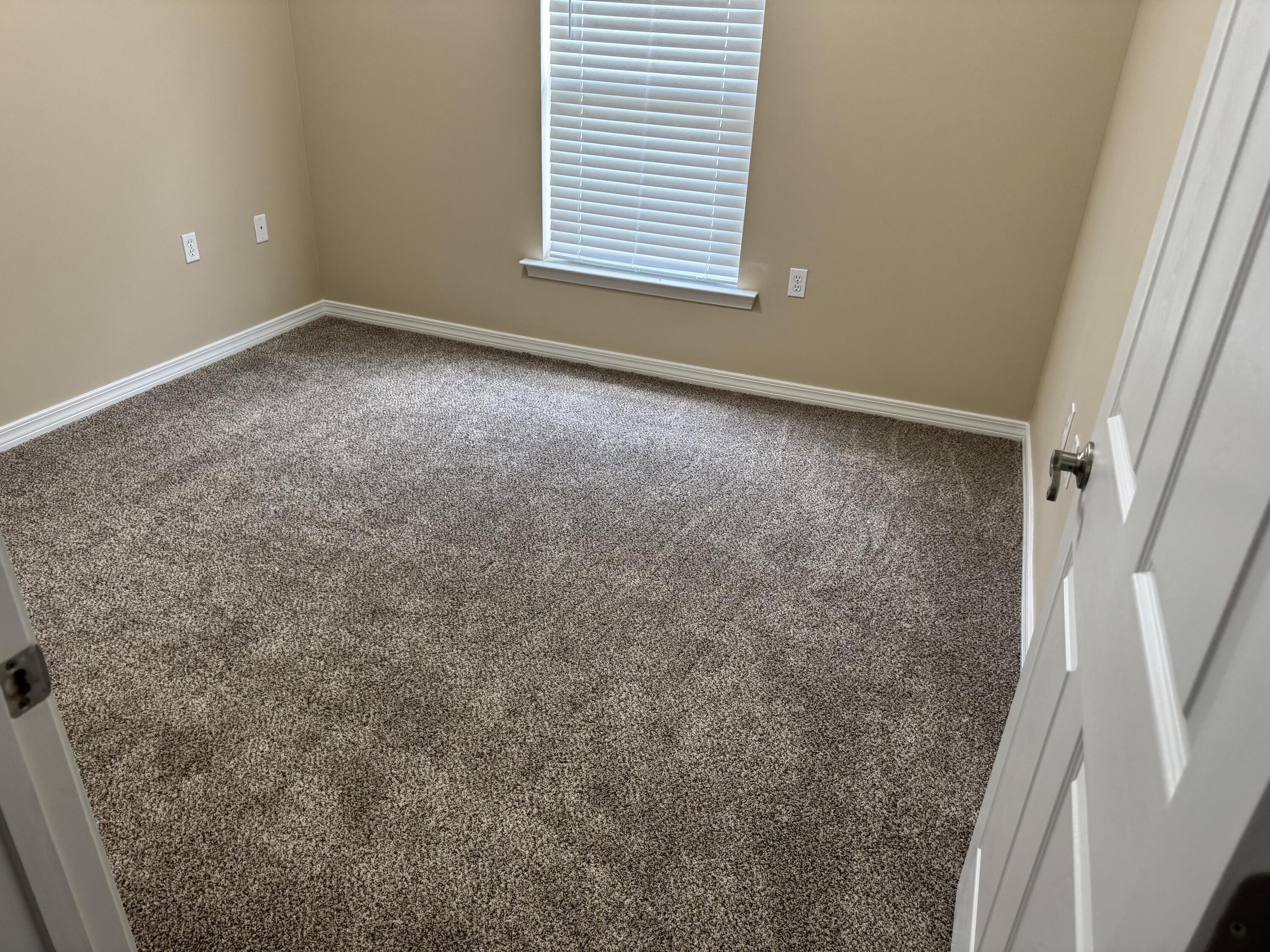 202 Ladue Avenue Crestview, FL 32539 - Photo 32 of 33 an empty room with a window