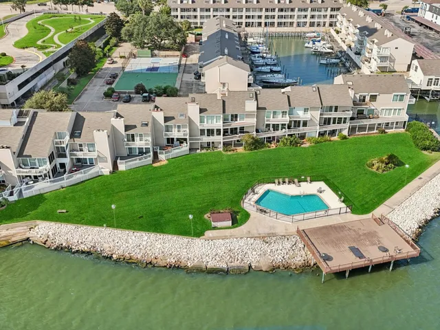 a aerial view of a house with a garden and plants