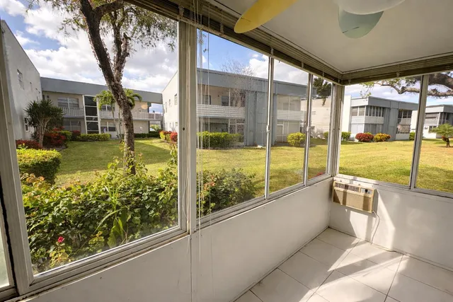 a view of swimming pool with a porch
