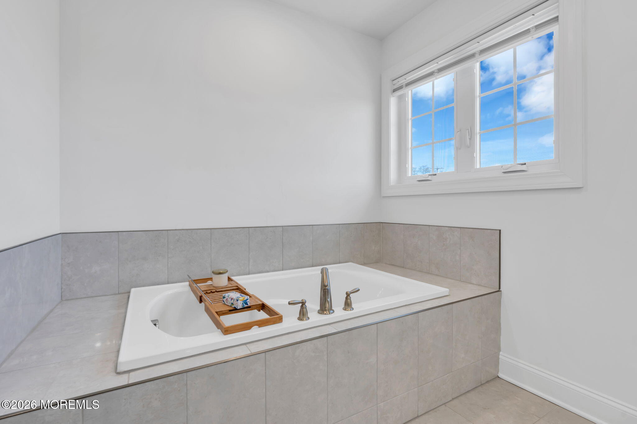 32 Tasha Lane Howell, NJ 07731 - Photo 38 of 72 a white bath tub sitting in a bathroom