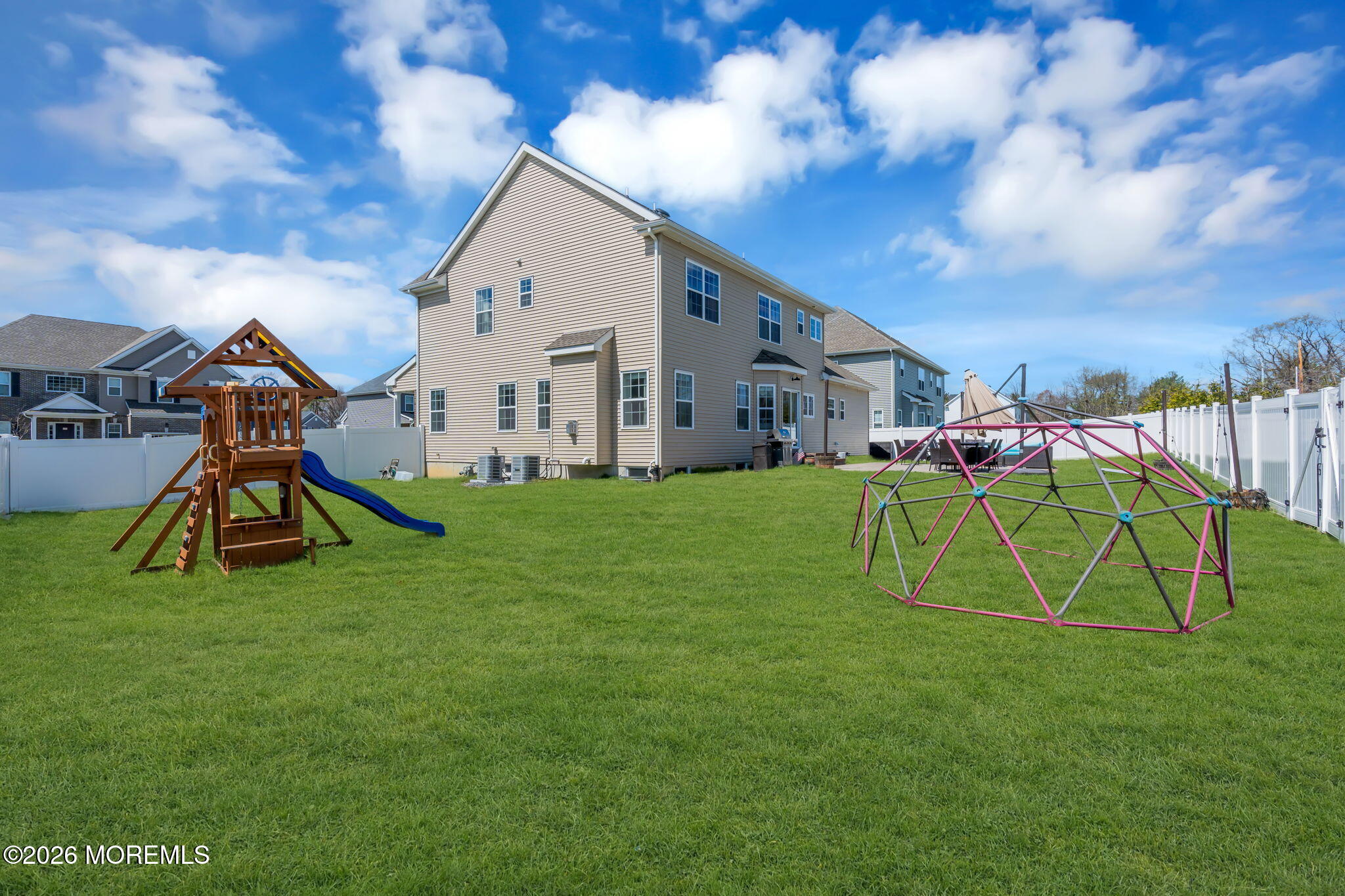 32 Tasha Lane Howell, NJ 07731 - Photo 51 of 72 a view of a house with a backyard and a slide