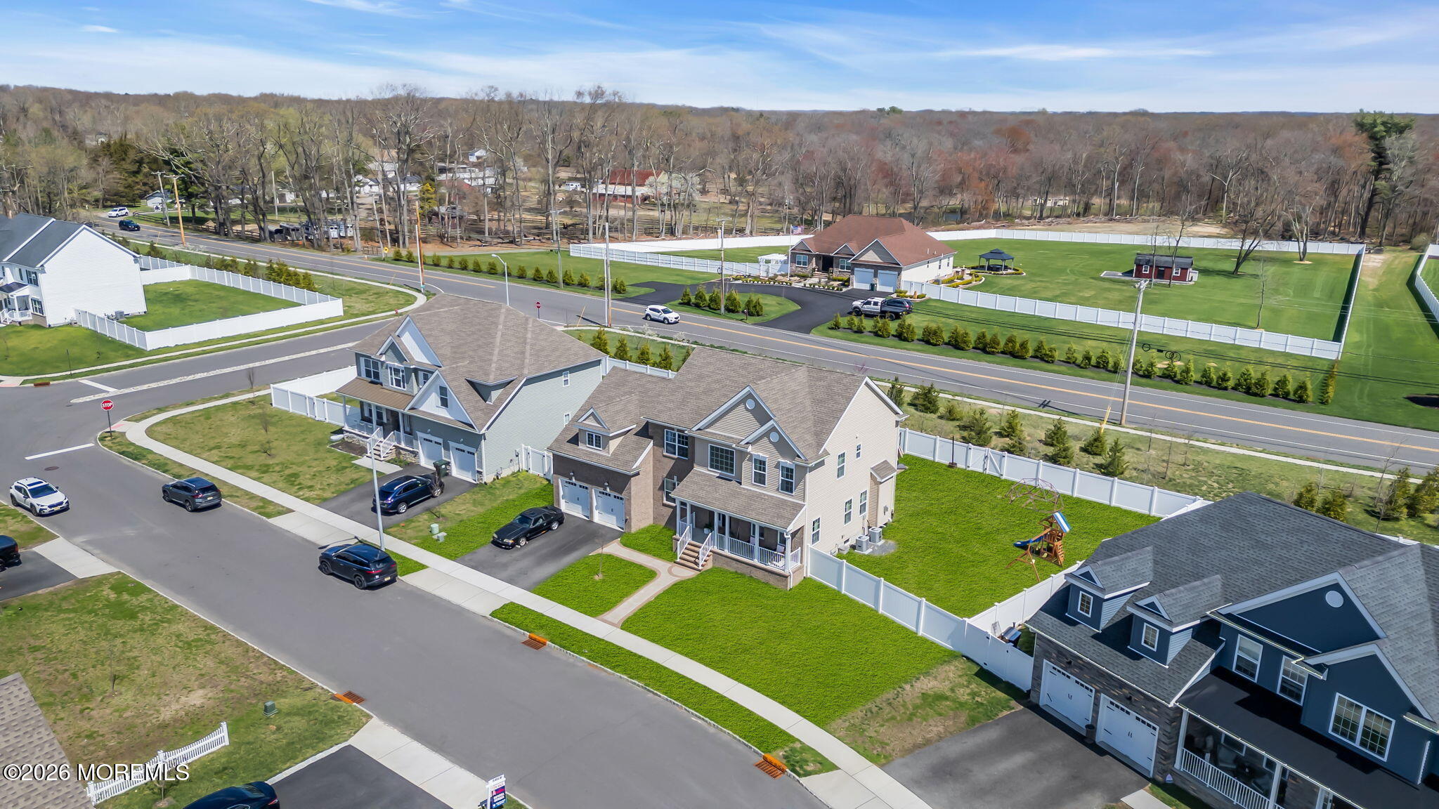 32 Tasha Lane Howell, NJ 07731 - Photo 59 of 72 an aerial view of a house with outdoor space and lake view
