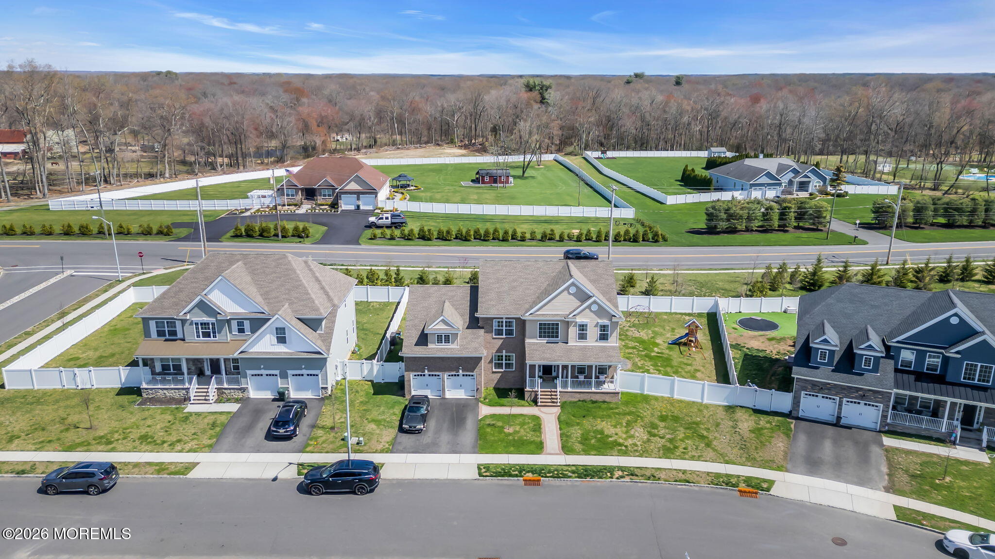 32 Tasha Lane Howell, NJ 07731 - Photo 71 of 72 an aerial view of a house with a garden and lake view