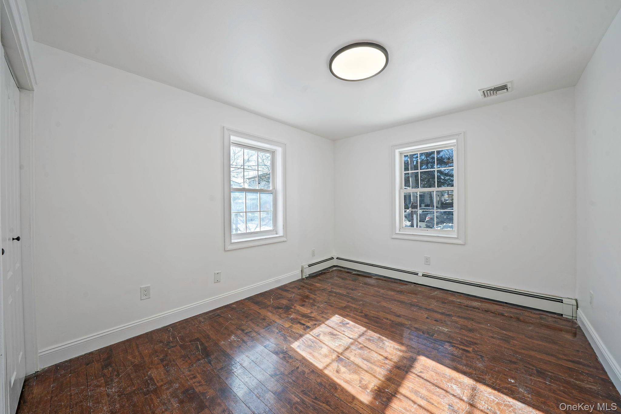 128 Bethune Boulevard Spring Valley, NY 10977 - Photo 13 of 34 an empty room with windows