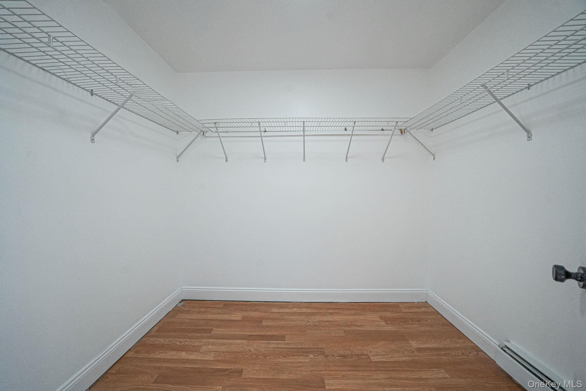 128 Bethune Boulevard Spring Valley, NY 10977 - Photo 22 of 34 a view of a room with empty racks