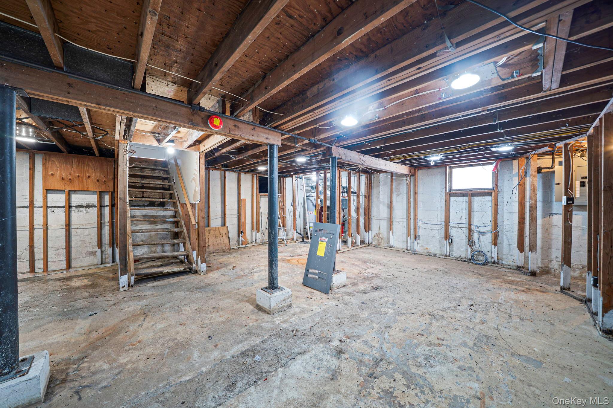 128 Bethune Boulevard Spring Valley, NY 10977 - Photo 33 of 34 a view of an empty room with stairs