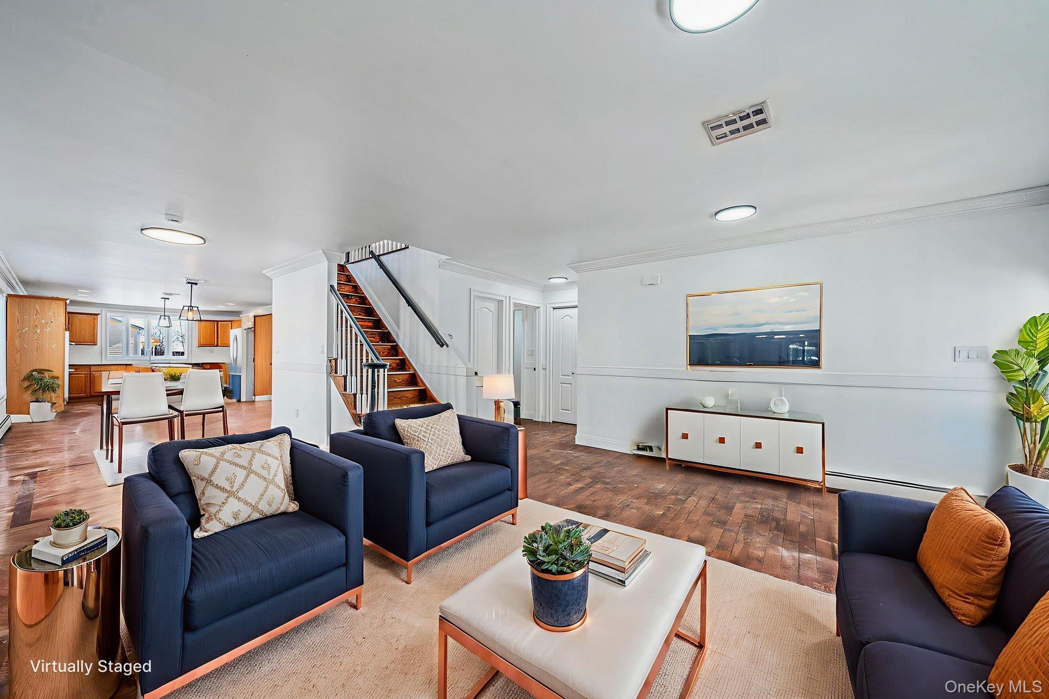 128 Bethune Boulevard Spring Valley, NY 10977 - Photo 6 of 34 a living room with furniture and a wooden floor