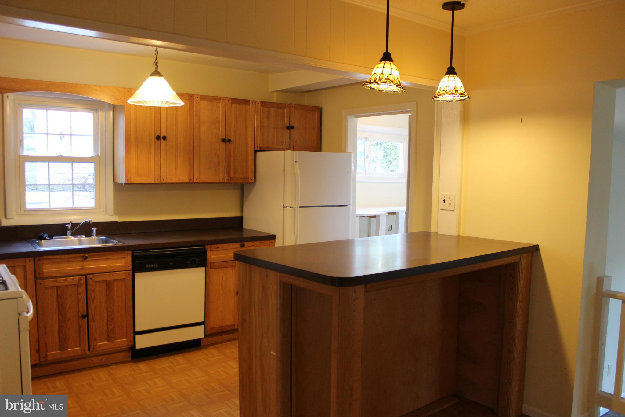 9613 Dallas Avenue Silver Spring, MD 20901 - Photo 2 of 26 Spacious kitchen with extra counter/sitting space
