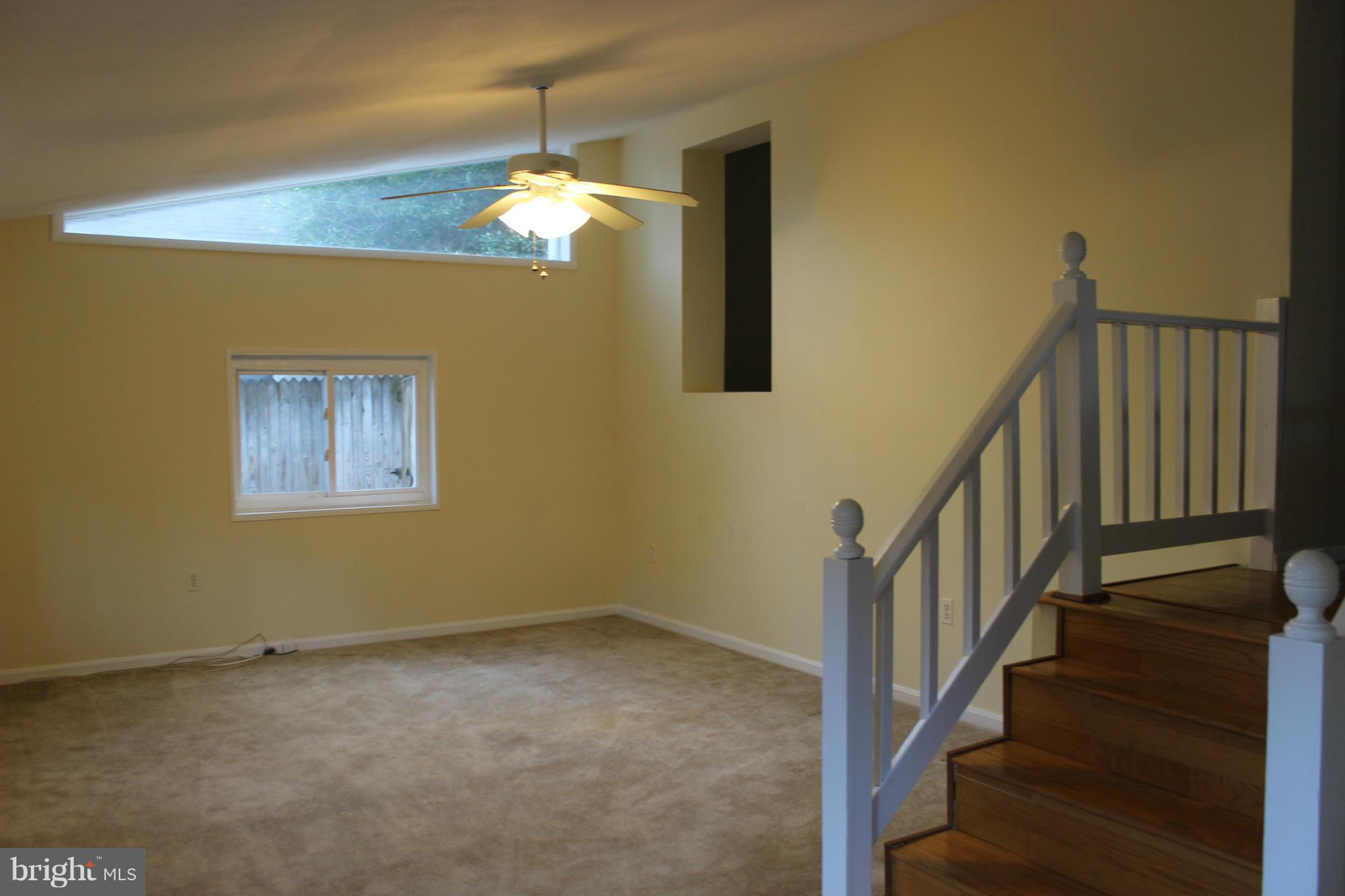 9613 Dallas Avenue Silver Spring, MD 20901 - Photo 3 of 26 Large family room with vaulted ceiling