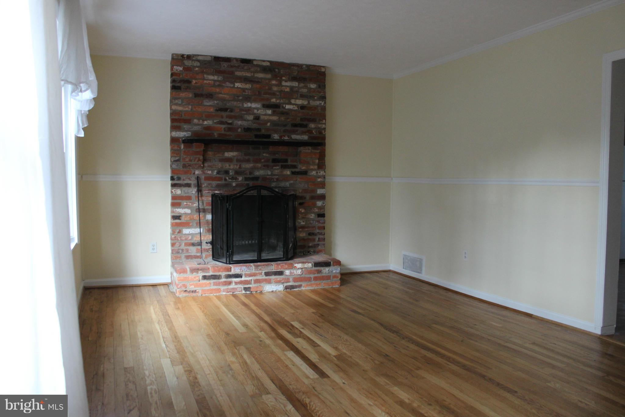 9613 Dallas Avenue Silver Spring, MD 20901 - Photo 6 of 26 Living room with hardwood floors