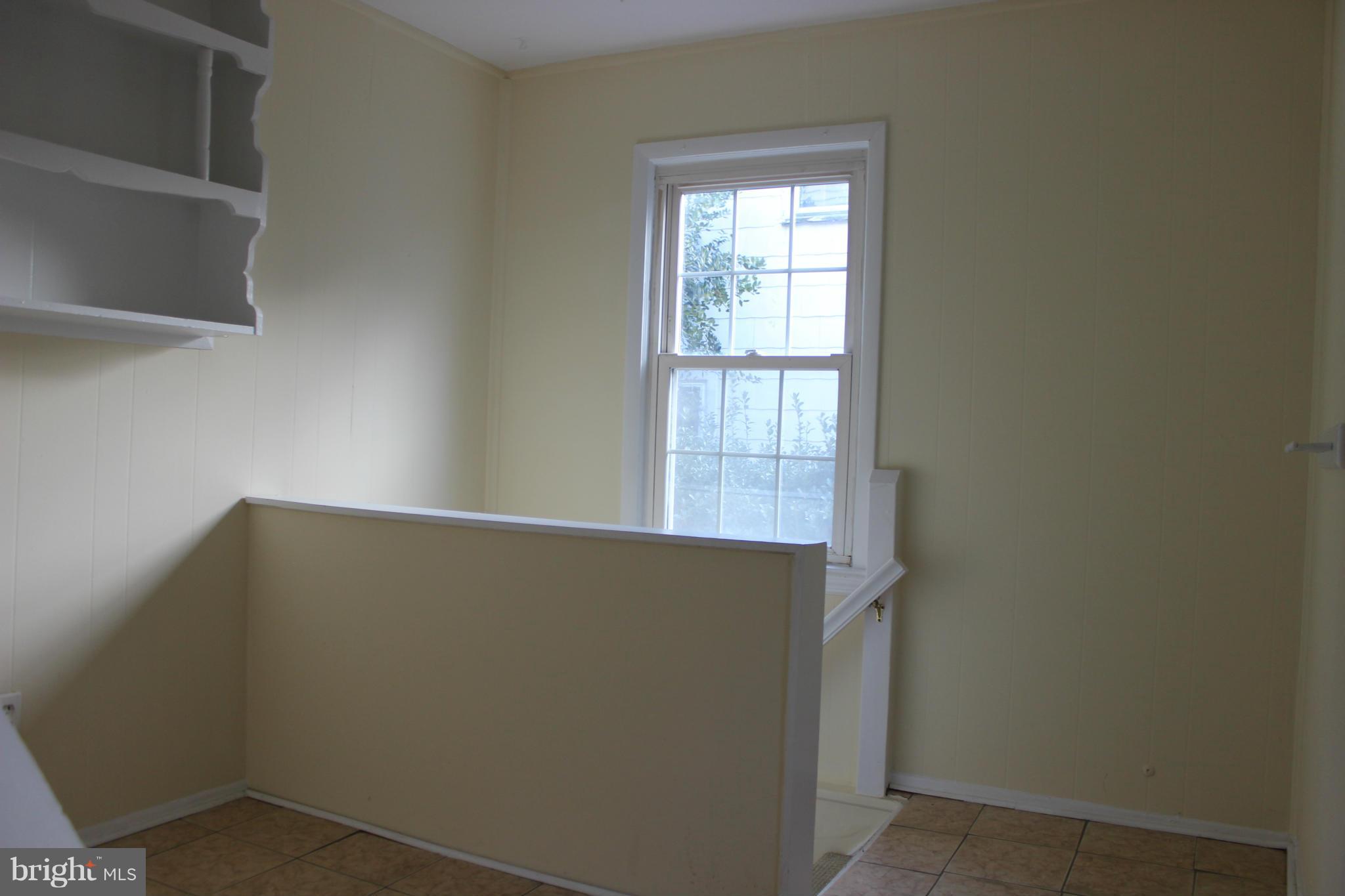 9613 Dallas Avenue Silver Spring, MD 20901 - Photo 7 of 26 Large foyer for shoes and jackets