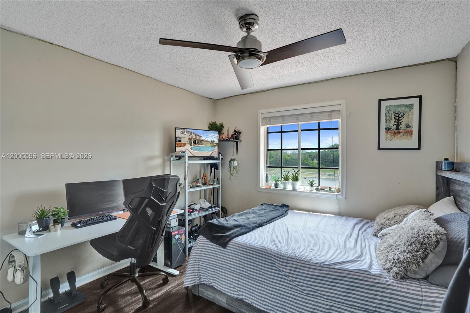4281 Laurel Ridge Circle Weston, FL 33331 - Photo 61 of 80 a bedroom that has a bed and a desk