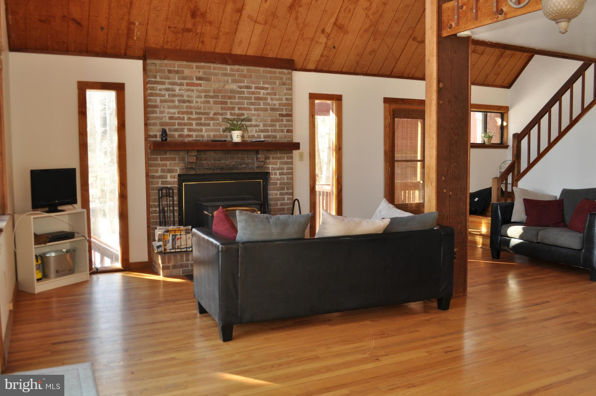 2710 Lookout Road Haymarket, VA 20169 - Photo 3 of 30 Open Living Area with Vaulted 2 Story Ceilings