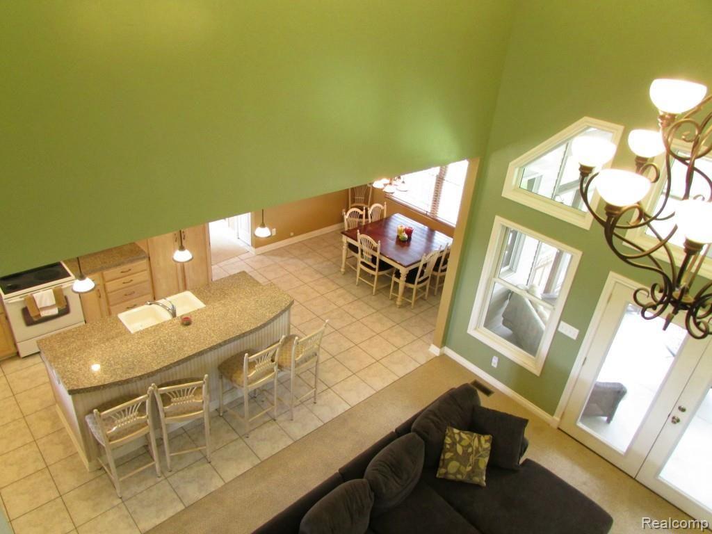 1699 Horton Lake Road Lapeer, MI 48446 - Photo 11 of 54 Great Room with High Ceilings and Open Access to Kitchen
