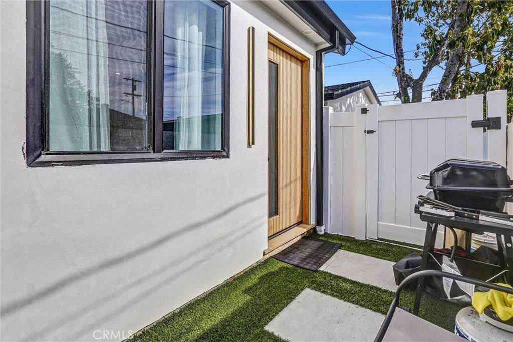 6902 Corbin Avenue Reseda, CA 91335 - Photo 5 of 10 a view of a balcony with chair and front door