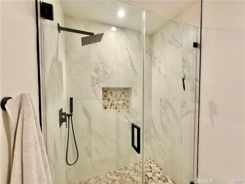 6902 Corbin Avenue Reseda, CA 91335 - Photo 8 of 10 a bathroom with a shower