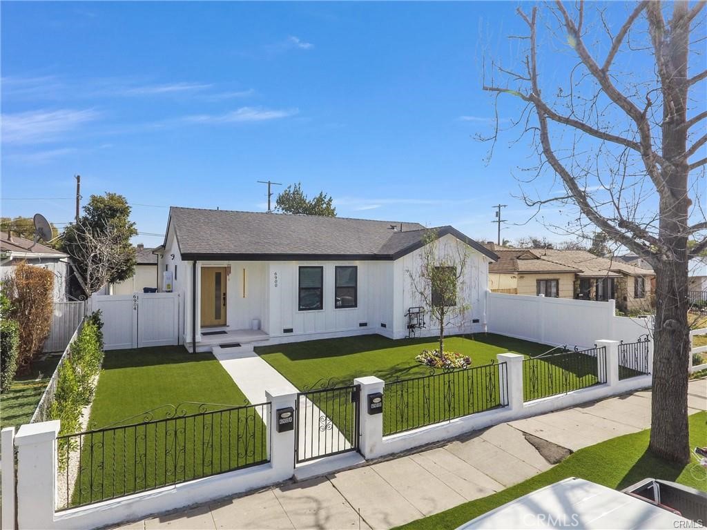 6902 Corbin Avenue Reseda, CA 91335 - Photo 9 of 10 a view of a house with pool and a yard