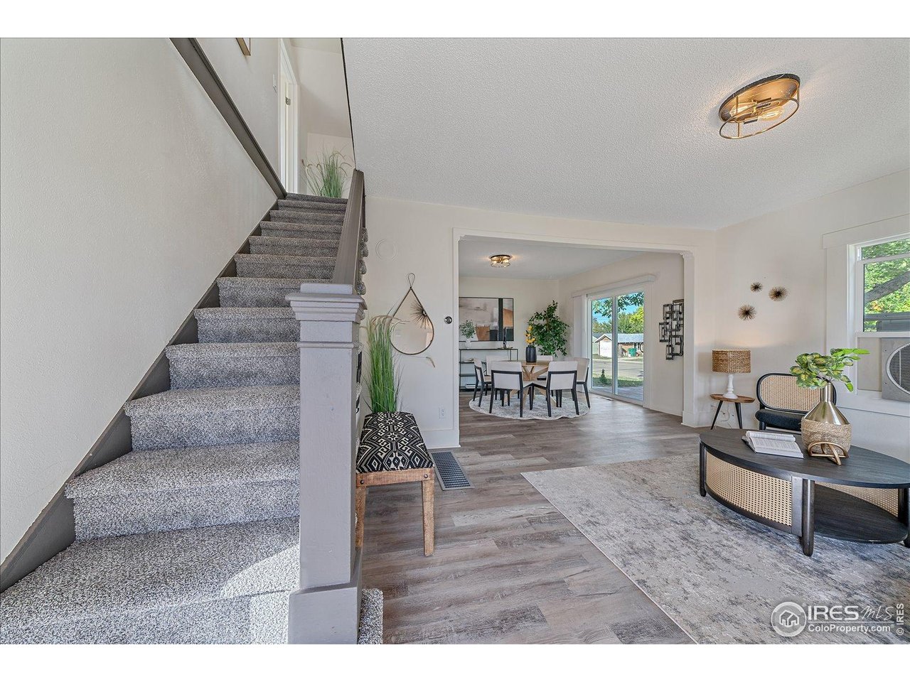 131 3rd Street Dacono, CO 80514 - Photo 3 of 28 a view of entryway and hall
