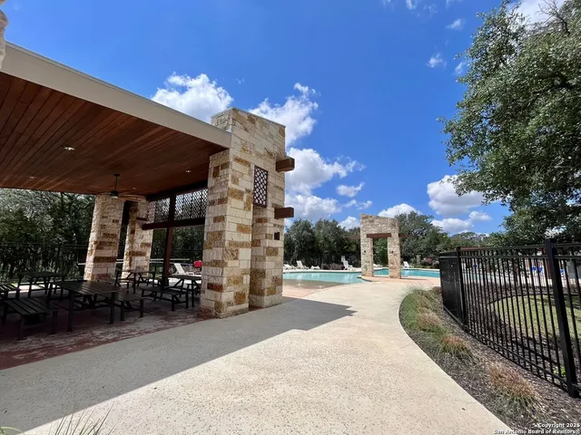 a view of a playground with basketball court