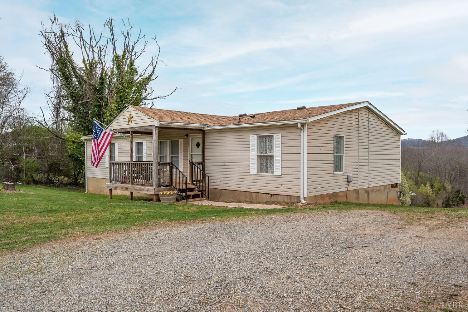 1105 Veteran Road Vinton, VA 24179 - Photo 2 of 37 a view of a house with a yard