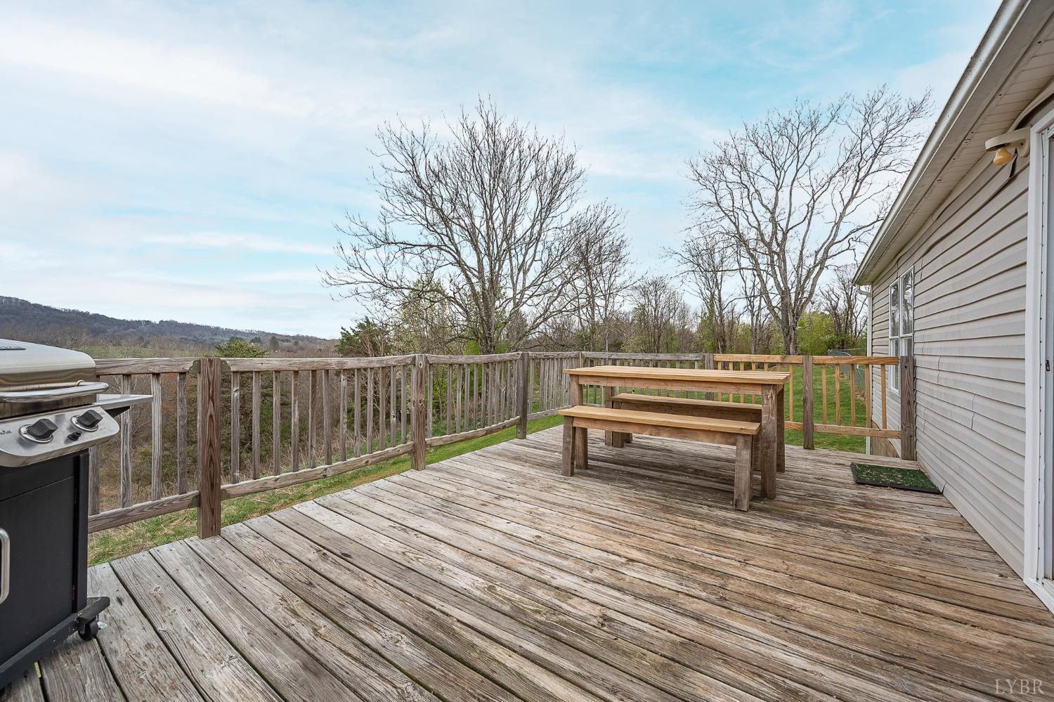 1105 Veteran Road Vinton, VA 24179 - Photo 26 of 37 a park view with a wooden floor and fence