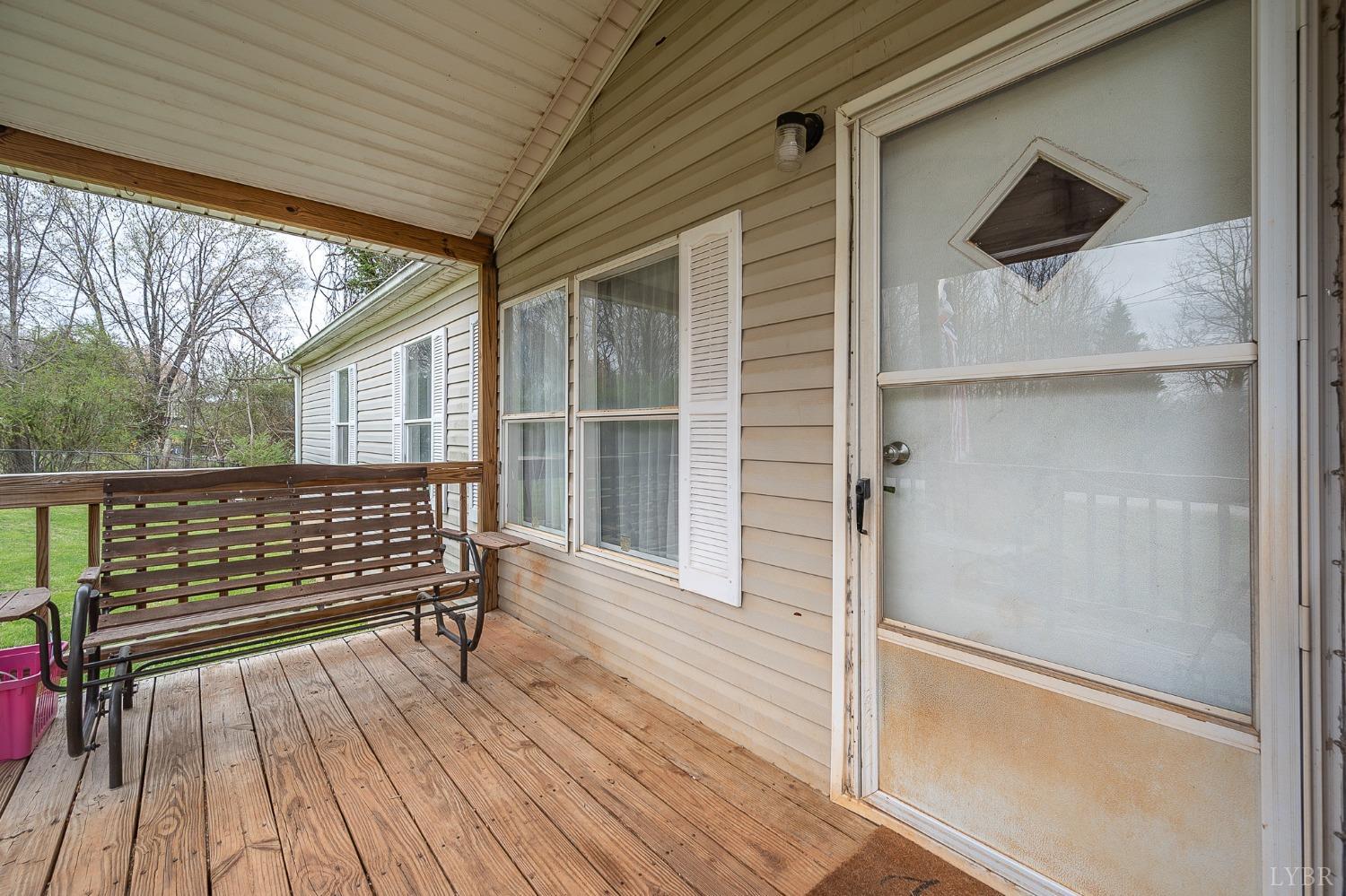 1105 Veteran Road Vinton, VA 24179 - Photo 5 of 37 a view of outdoor space with deck and wooden floor