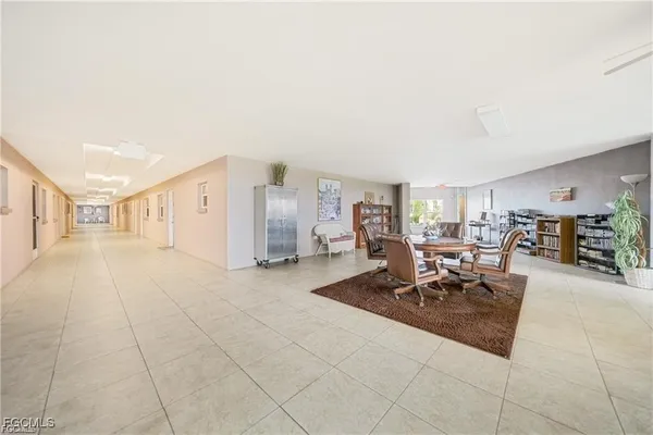 a view of living room with furniture and a couch