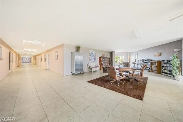 a view of living room with furniture and a couch