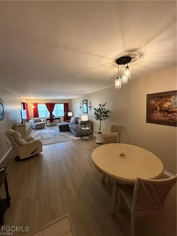 a view of a dining room with furniture