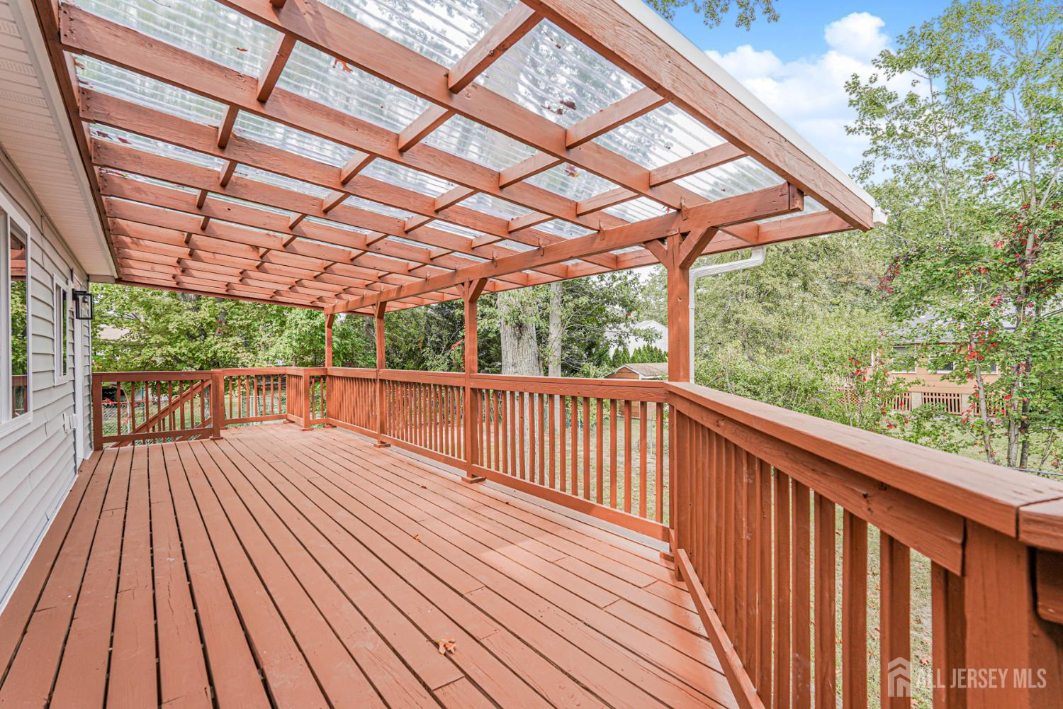20 Daniel Road Spotswood, NJ 08884 - Photo 15 of 29 a view of porch with wooden floor in outdoor space