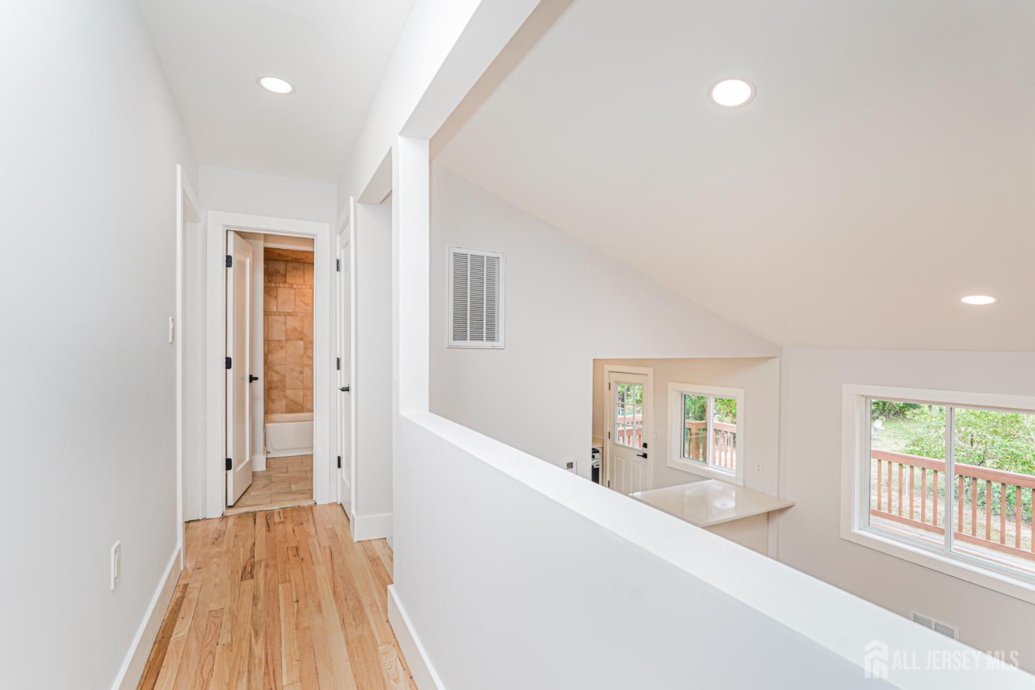 20 Daniel Road Spotswood, NJ 08884 - Photo 16 of 29 wooden floor in an empty room with a window