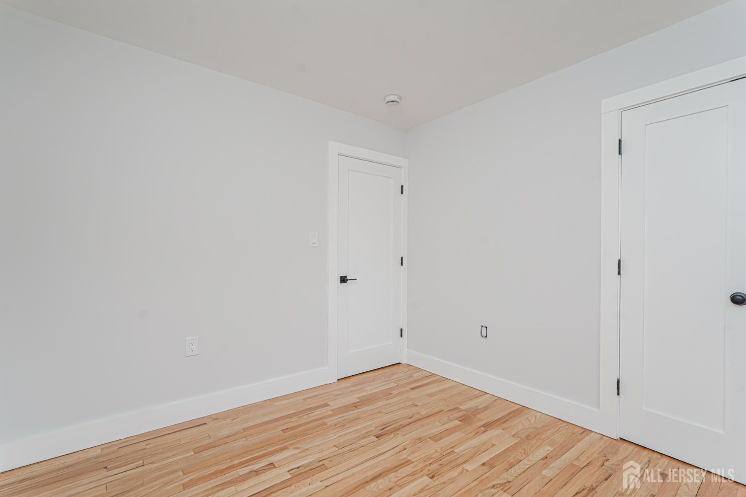 20 Daniel Road Spotswood, NJ 08884 - Photo 21 of 29 a view of empty room with wooden floor