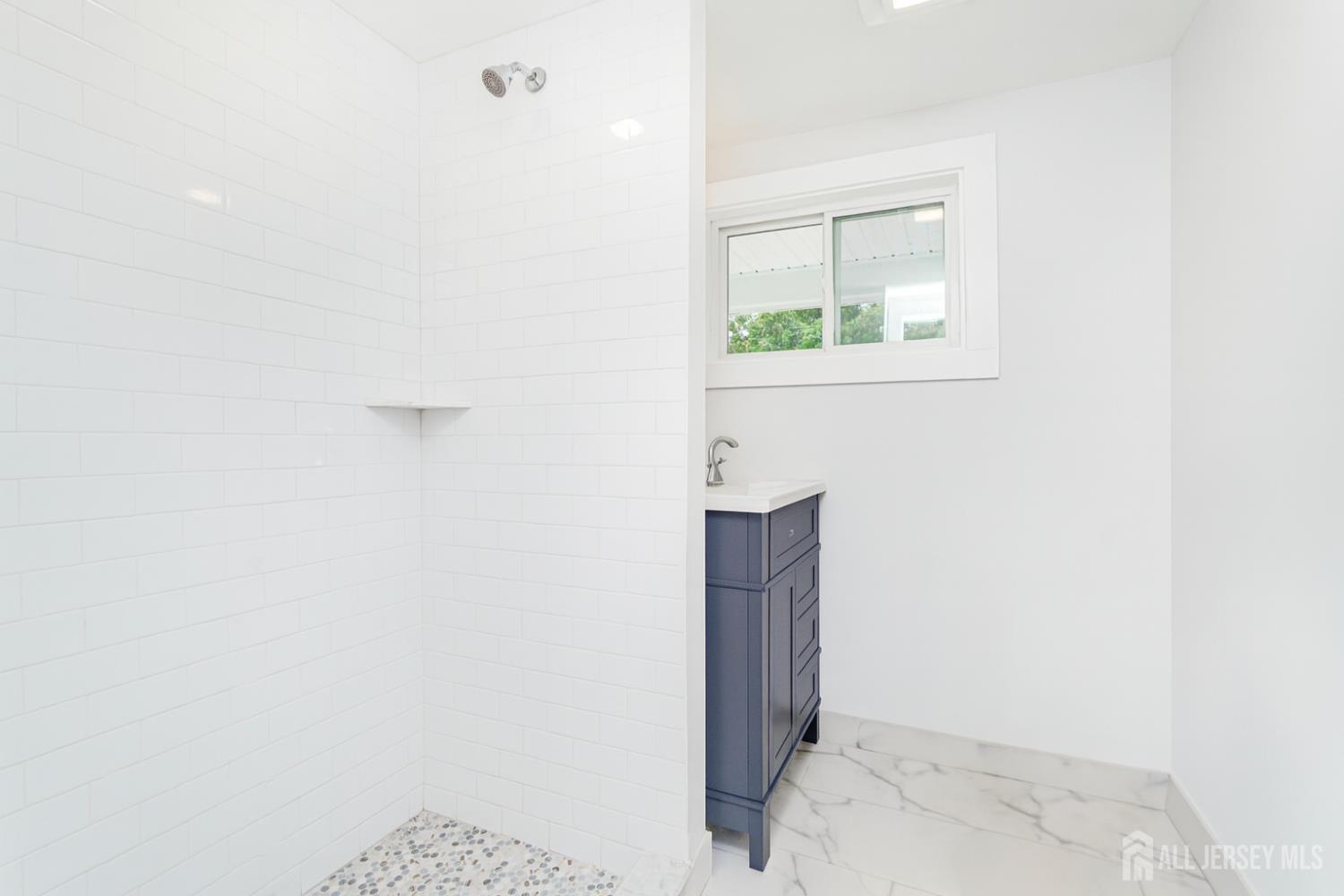 20 Daniel Road Spotswood, NJ 08884 - Photo 23 of 29 a view of a small space with wooden floor and a window